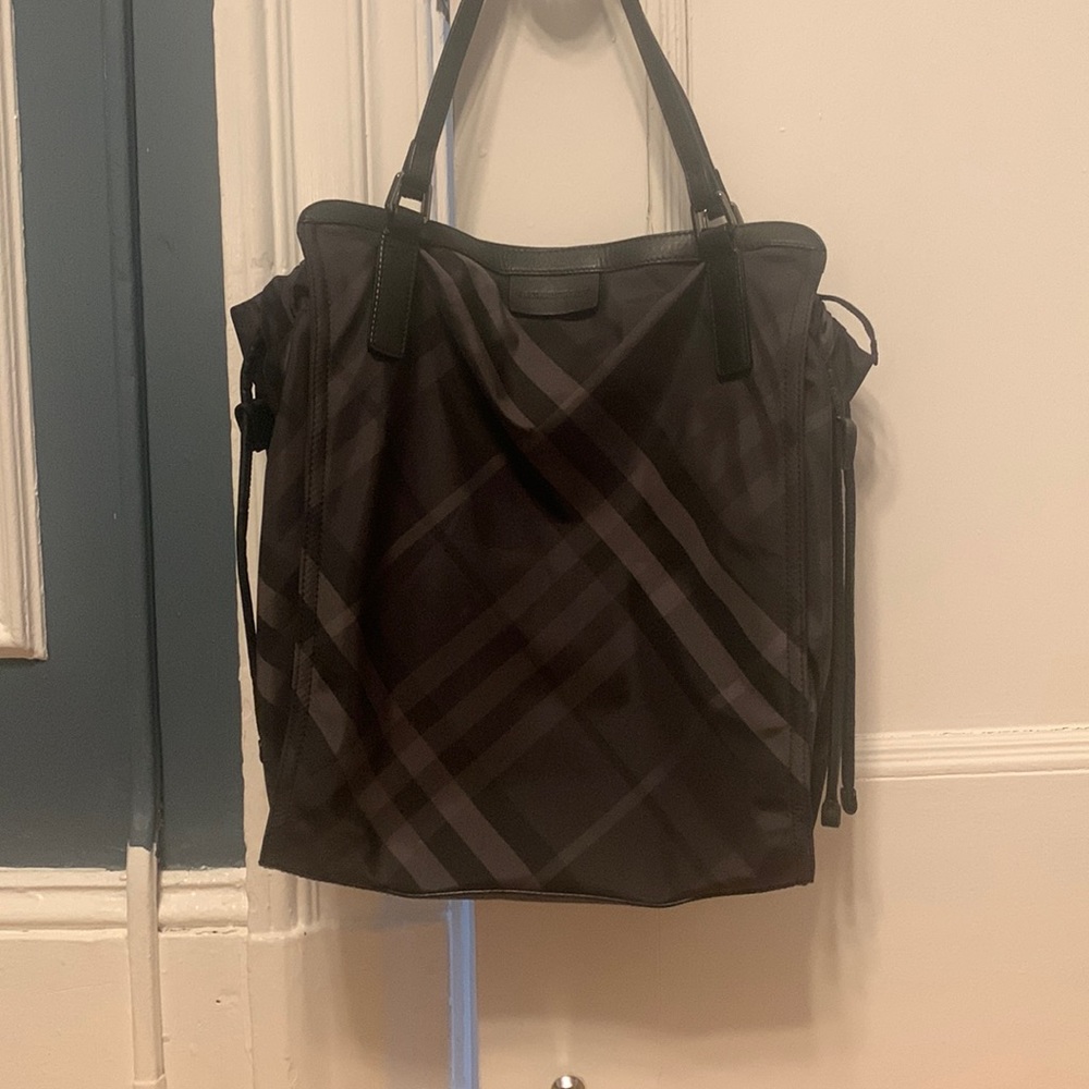 Black Burberry tote bag.